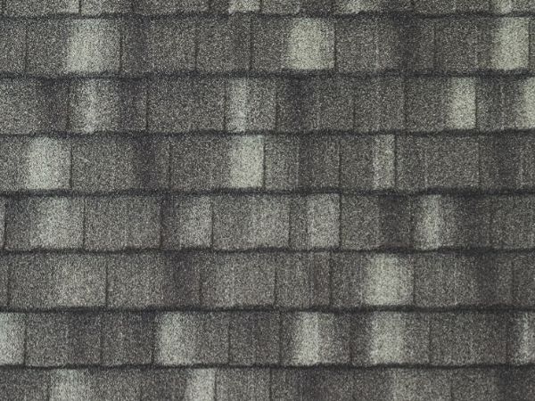 Cottage-style ironwood stone-coated steel roof with textured finish