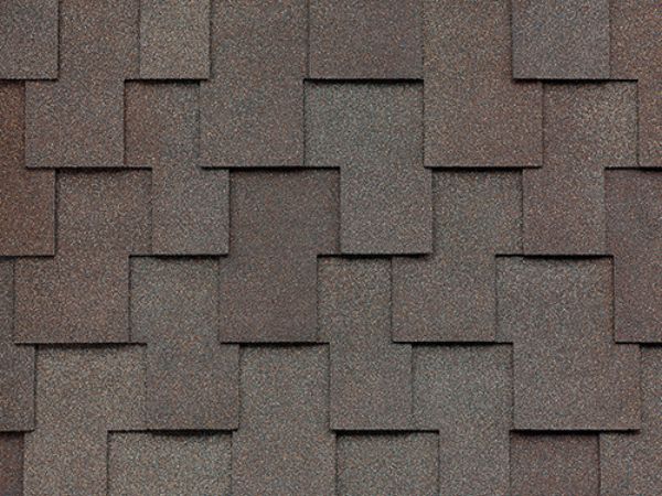 Close-up of Malarkey Windsor Heather shingles in soft grayish-brown with earthy texture for timeless roofing