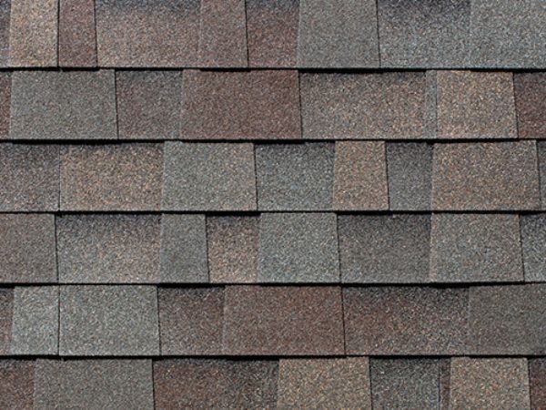 Malarkey Natural Wood asphalt shingles with warm light brown wood-grain tones for rustic roofing