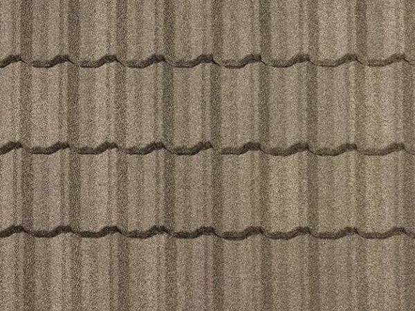 Harborwood Pacific Tile stone-coated metal roofing with coastal gray-brown wave styling