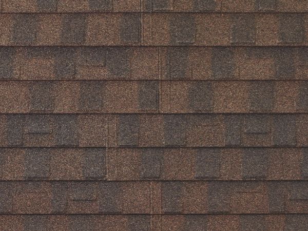 Barclay Ridge Shingle stone-coated metal roofing with rustic reddish-brown and gray tones