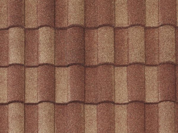 Santa Fe Vault Tile stone-coated metal roofing in vibrant red and orange hues