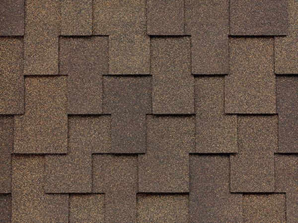 Close-up of Malarkey Windsor Antique Brown shingles in deep rustic brown with speckled texture for durable roofing