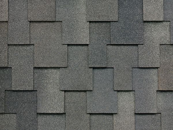 Close-up of Malarkey Windsor Storm Grey shingles in medium gray with textured finish for durable roofing