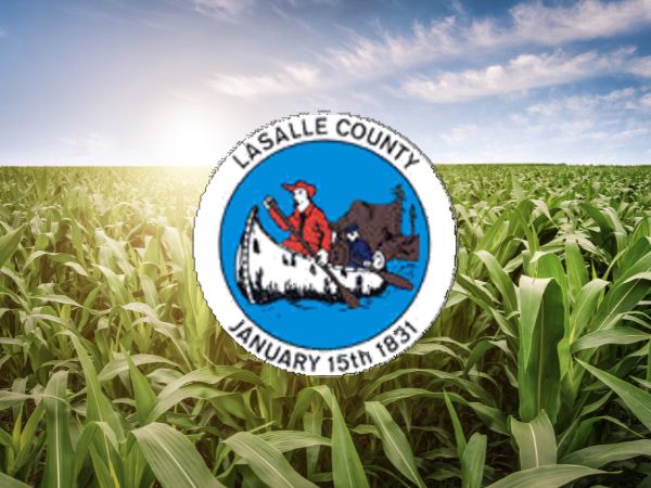 LaSalle County seal with canoe illustration and cornfield background for roofing services